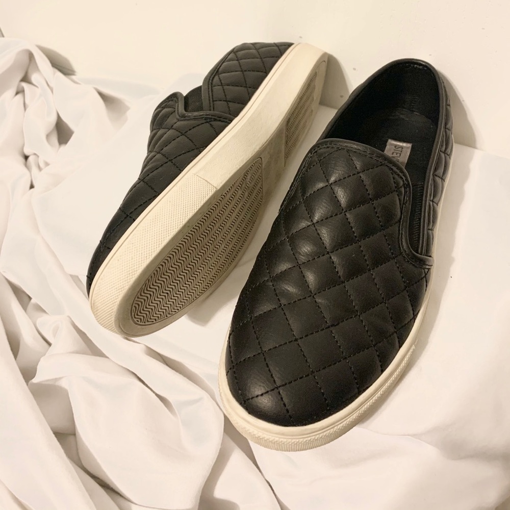 Black Steve Madden quilted slip-ons
